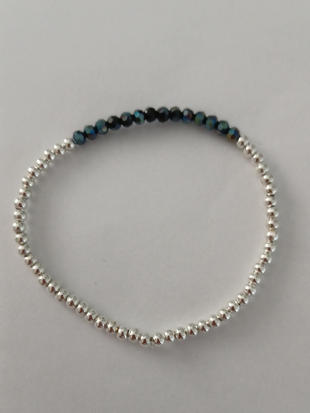 Silver Beaded Bracelet with Iridescent Blue Accent